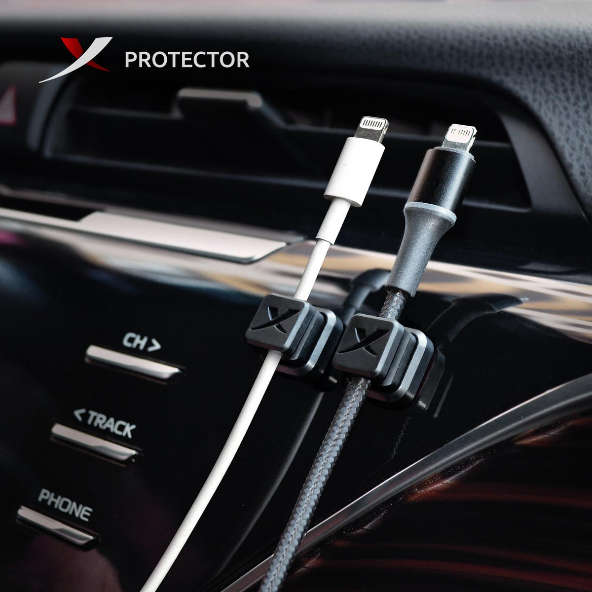 X-Protector cord holder on a wall keeps cords within reach and tidy.