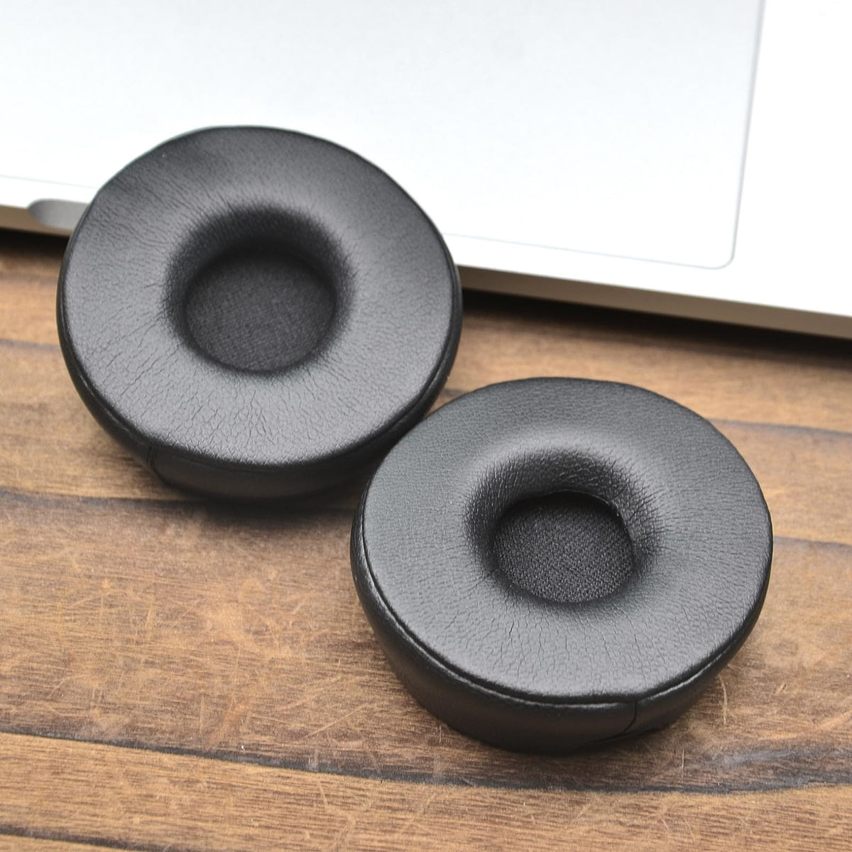 XBERSTAR Engage 75 earpads side view showing soft leather texture and durability.