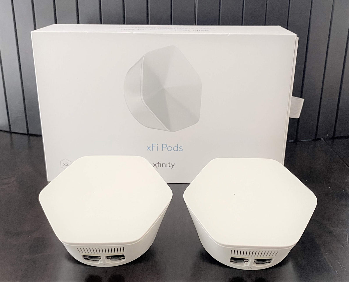Xfinity XE2-SG XFI Pod front view shows dual-pack for wider coverage
