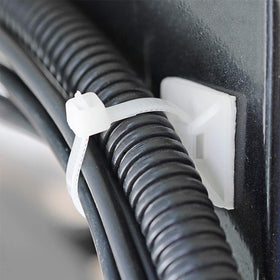 XHF mount installed under desk organizing cables neatly and safely