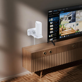 XLTTYWL wall mount installed on wall offers clean cord management and tidy equipment setup.