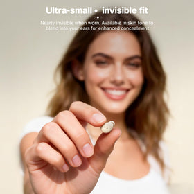 Closeup of Xmenha mini invisible earbuds emphasizing compact design