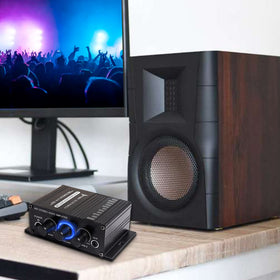 XMSJSIY compact amplifier in use in a car for high-fidelity sound.