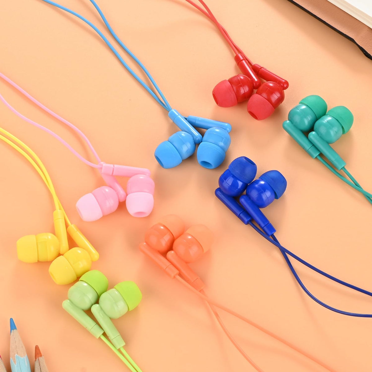 XOSDA earbuds in use by students in a classroom setting for simple plug-and-play listening