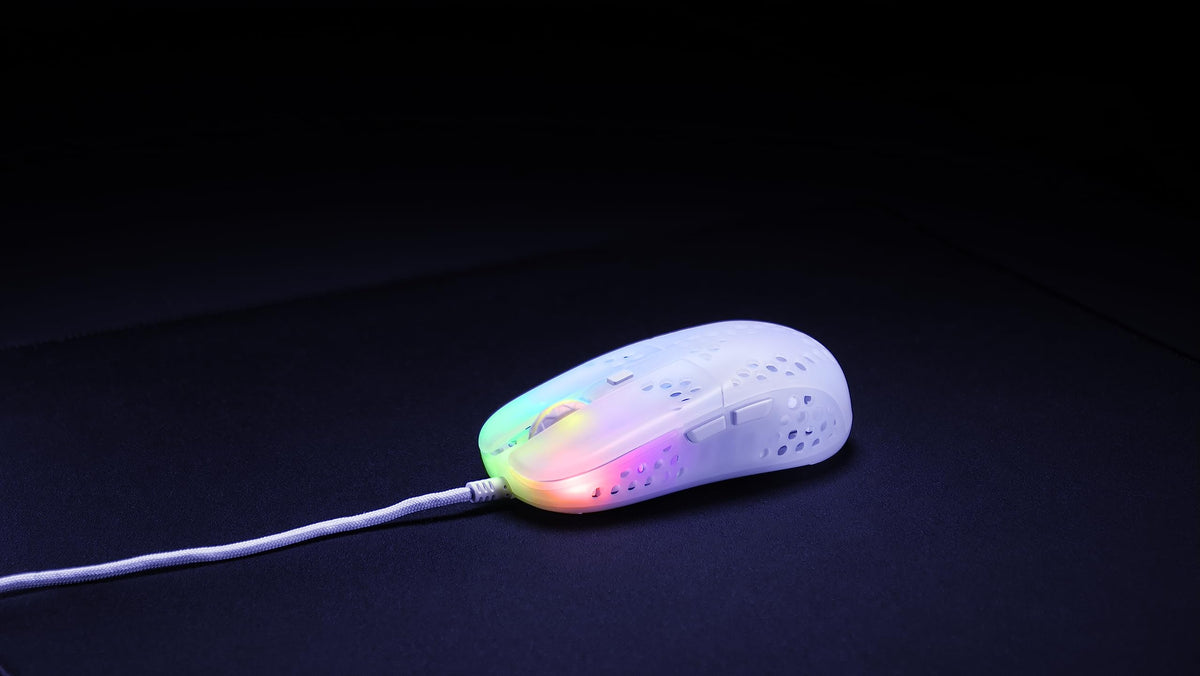 Xtrfy MZ1 next to ruler showing compact size and weight benefit
