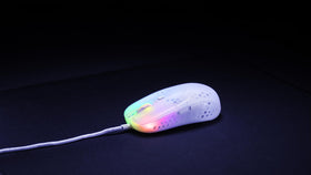 Xtrfy MZ1 next to ruler showing compact size and weight benefit