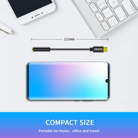 Xumee dongle in pocket ready for travel and on-the-go listening