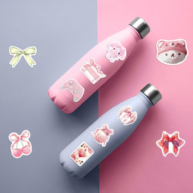 Yaamonn Coquette stickers decorate a skateboard or guitar for colorful flair.