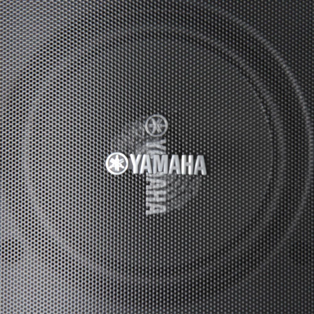 Yamaha NS-AW194WH patio setup illustrates immersive outdoor listening.