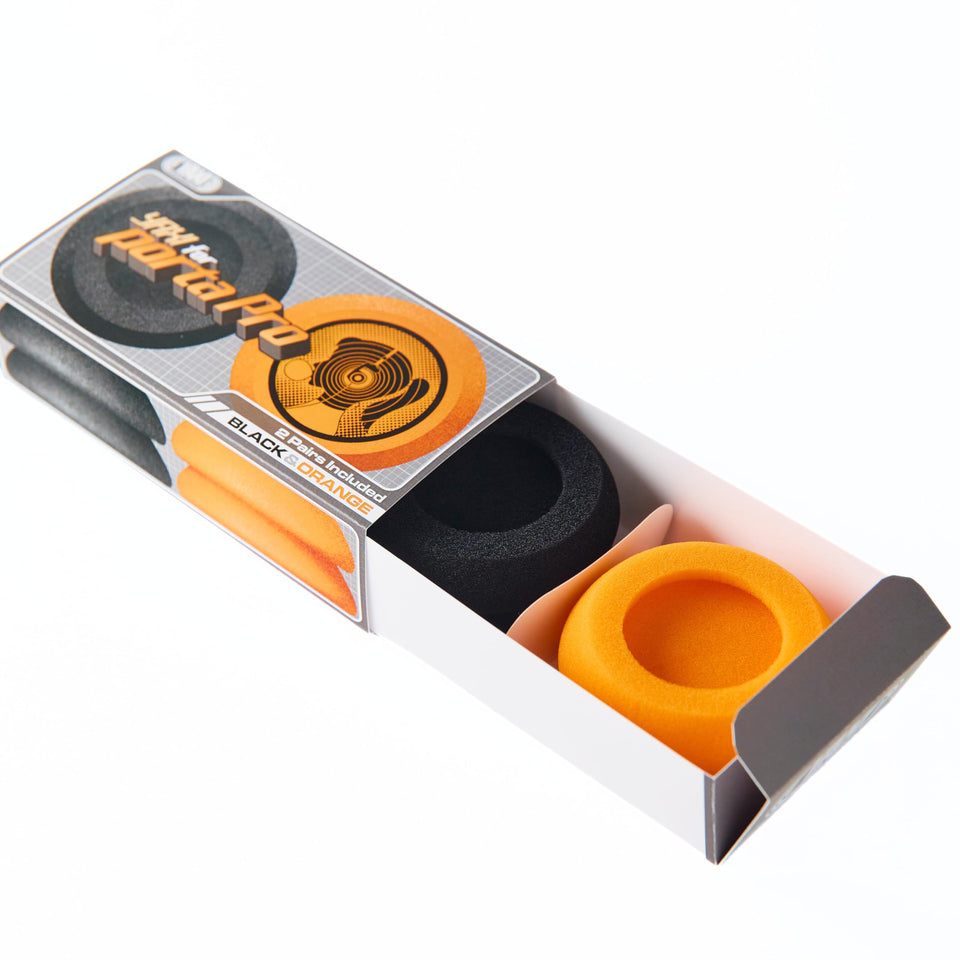 YAXI Porta Pro orange earpads close-up for cushioned comfort and fit.