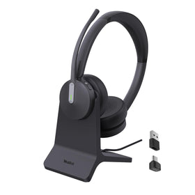 Yealink BH70 headset on desk with charging stand for clear calls.