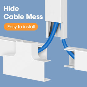 YesBes installed behind wall-mounted TV showing low-profile concealment benefit