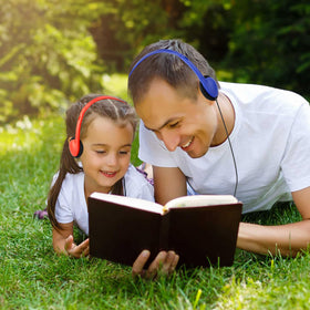 YFSFQS headphones next to ruler showing compact size for young students