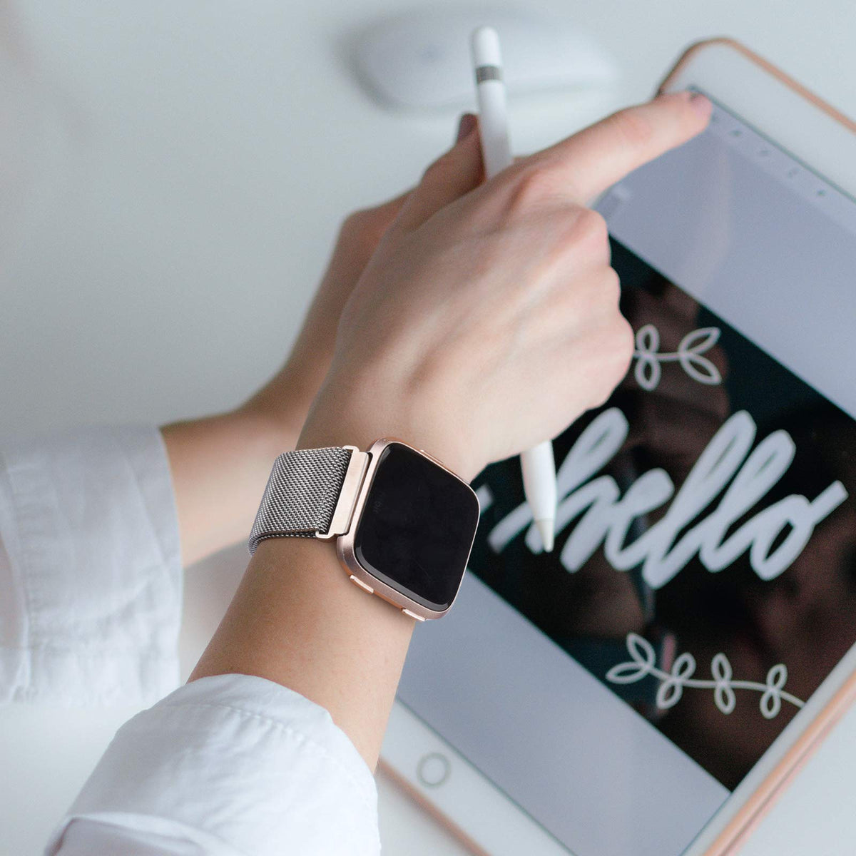 YILED band worn on wrist with Fitbit Versa, stylish everyday look benefit
