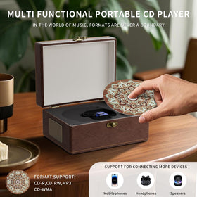 Yintiny player with open lid and CD visible, demonstrating secure disc placement and travel-ready design
