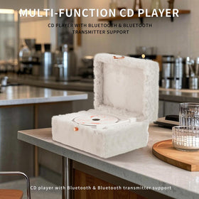 Yintiny player held in hand to show compact size and portability benefit
