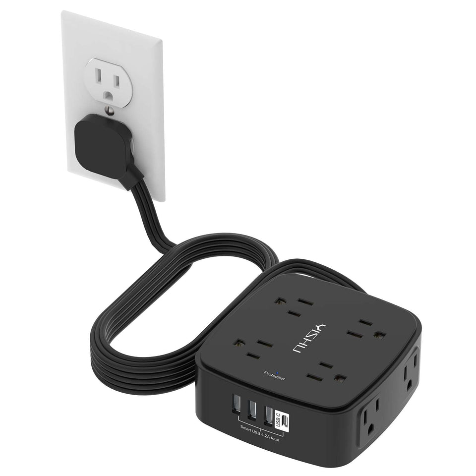 YISHU 10ft surge protector with USB ports on a desk setup for multiple device charging