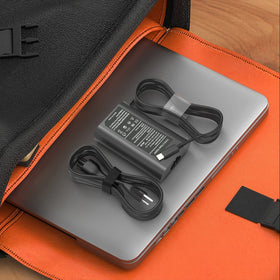 YLLKJJT 65W USB-C charger in use with Dell Latitude.