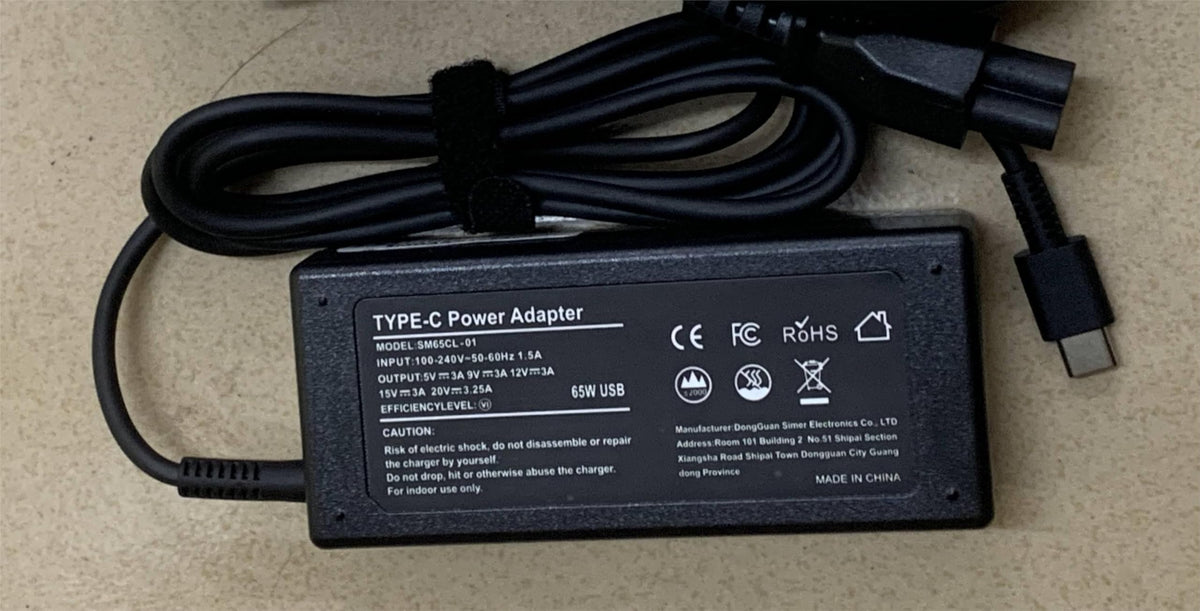 Ymawetia 90W adapter on desk setup with Vaio