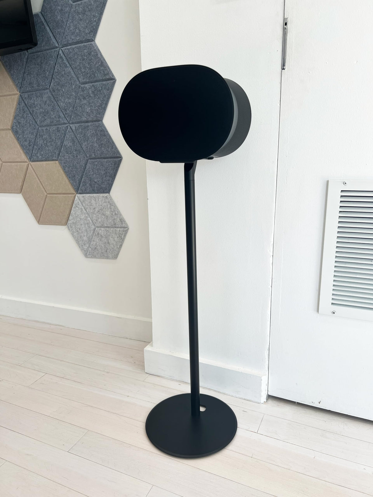 ynVISION.DESIGN sleek-modern stand enhances room aesthetics while keeping audio performance in focus