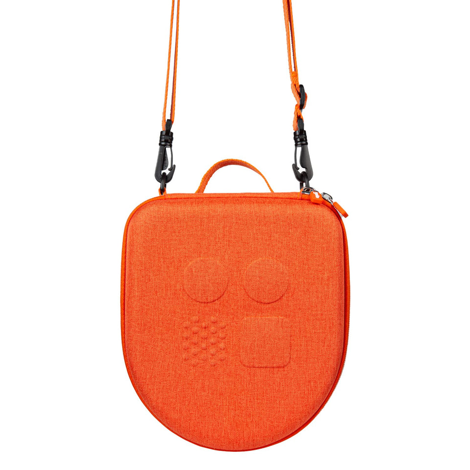 Yoto front view showing hard-shell protection and easy grab handle benefit