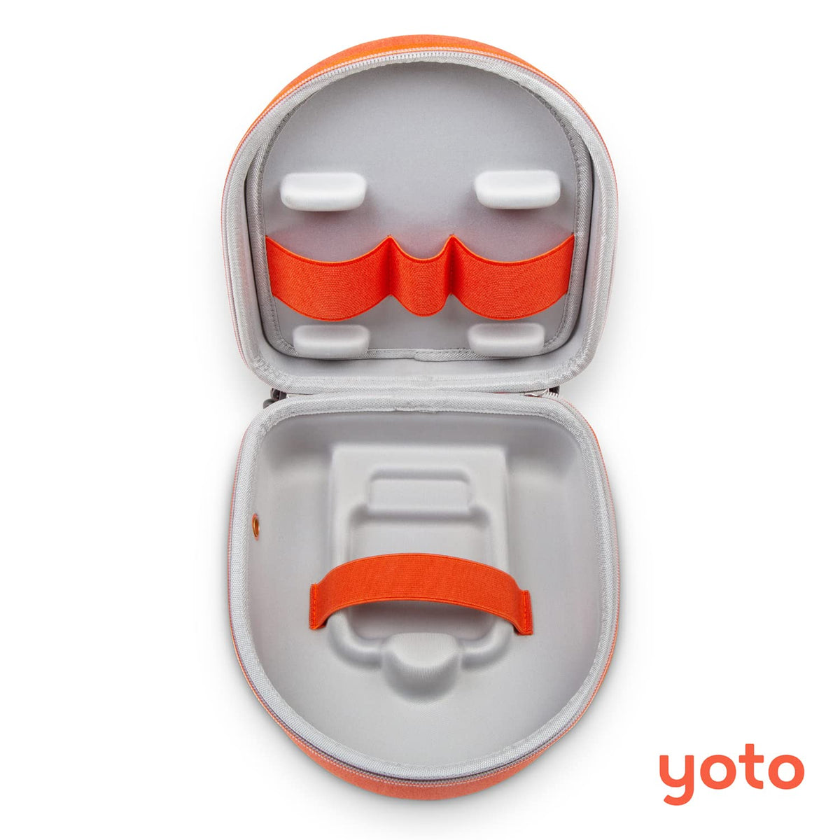 Yoto case beside cards and headphones showing compact travel-size benefit