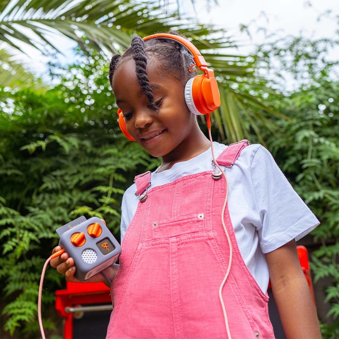 Yoto wired headphones in use by kids for quiet learning.