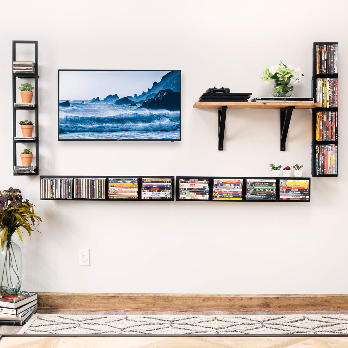 You Have Space Wall Mount 34 Inch Media Storage Rack CD holder beside the desk for quick retrieval