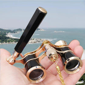 Yourelexit front view of opera glasses showing compact vintage design and clear optics