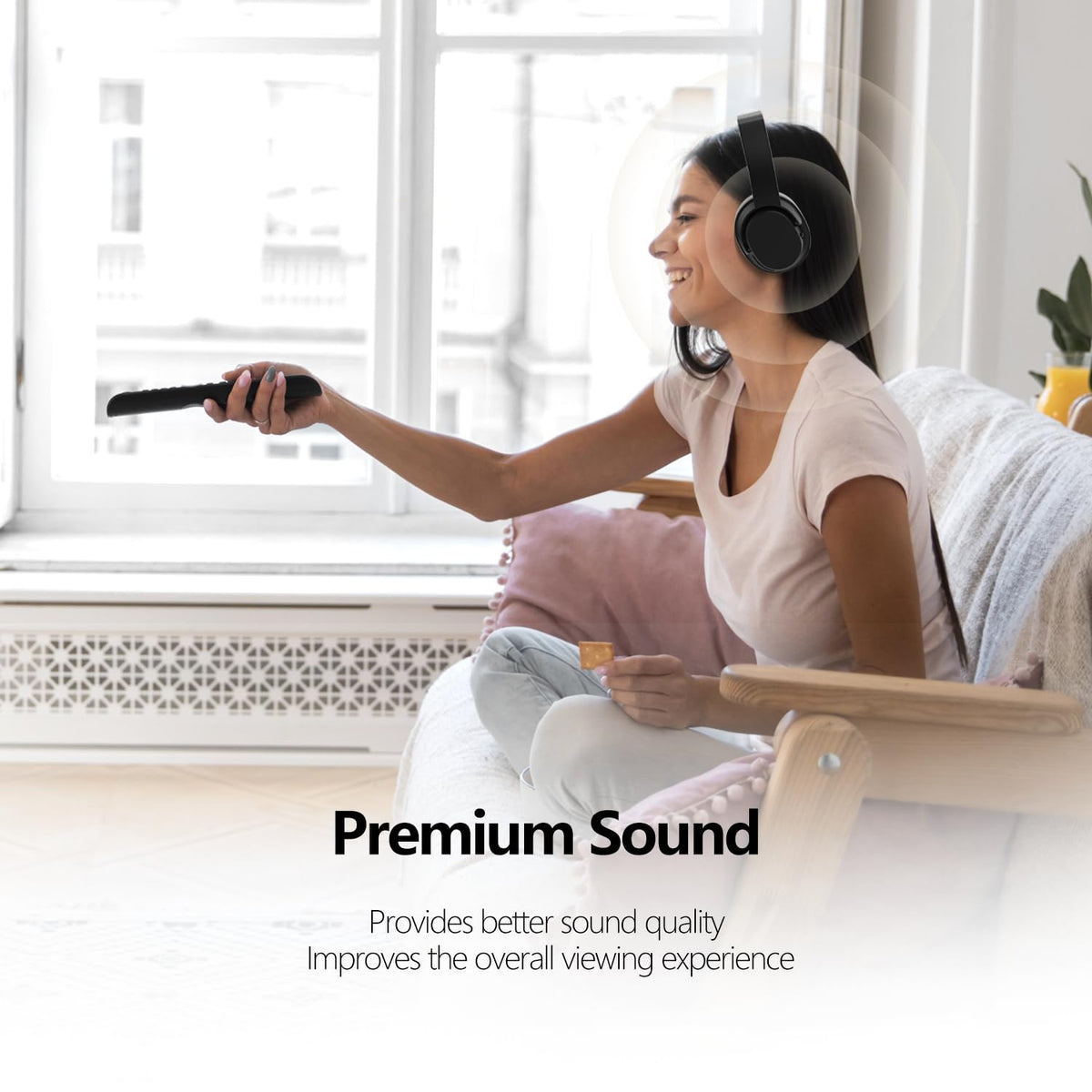 YOYOTUNE headset next to remote for size and scale reference