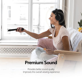 YOYOTUNE headset next to remote for size and scale reference