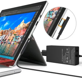 YTech charger plugged into a Surface laptop demonstrating fast, stable charging benefit