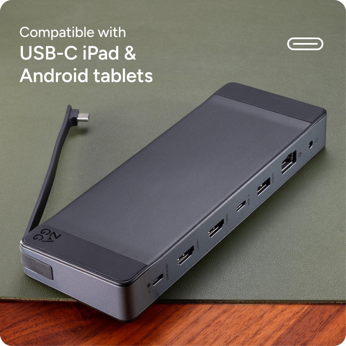 zagg hub next to laptop showing scale and portability for on-the-go setups