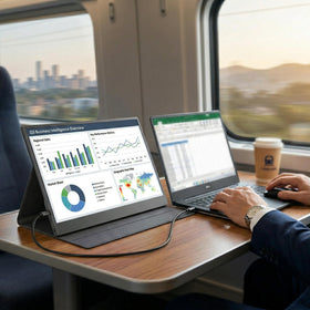 ZefcS next to laptop showing scale and lightweight portability benefit