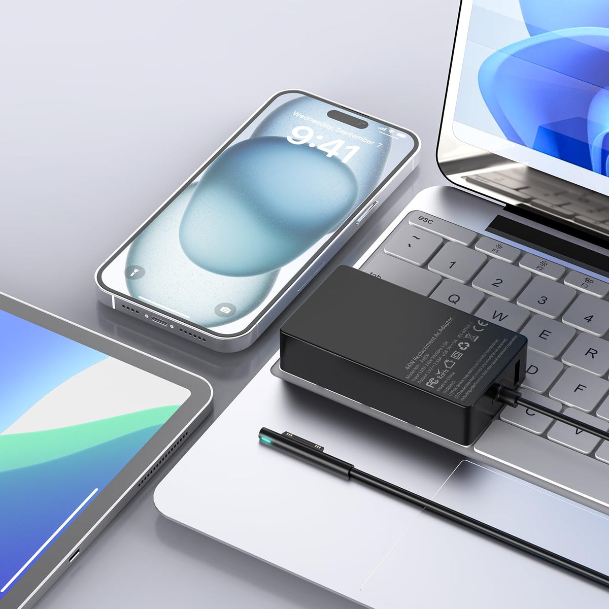 Zeshuo USB port charging a second device alongside the Surface