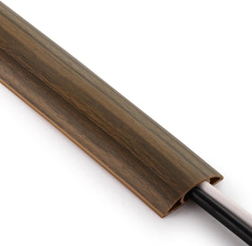 ZhiYo 10ft cord cover on the floor conceals a thick extension cord safely.