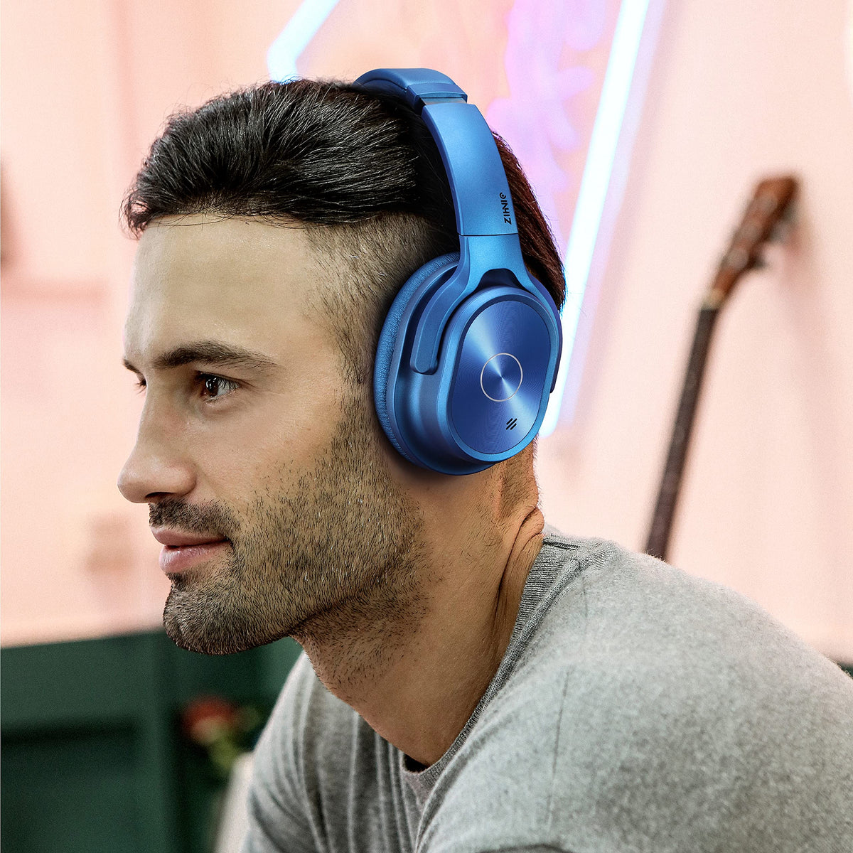 ZIHNIC folded headset next to passport showing compact travel convenience