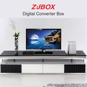 ZJBOX remote and included cables showing quick setup convenience