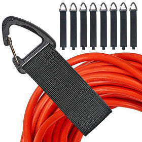 ZTSXLLIM extension cord organizer hanging on a nail for garage storage.